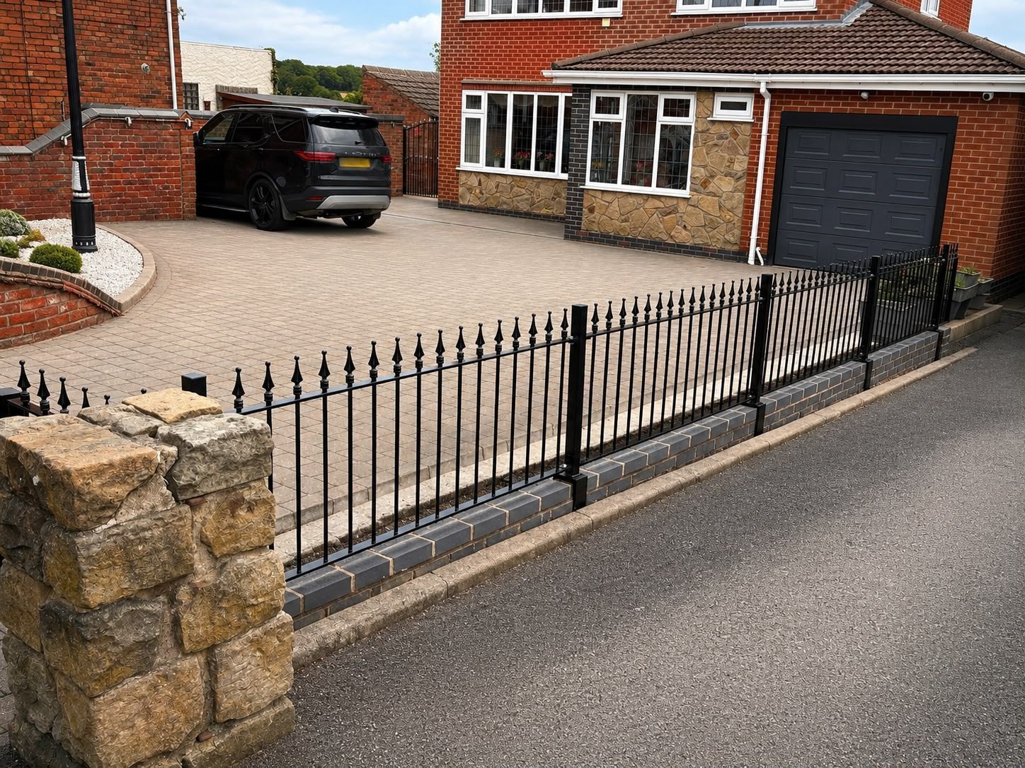 Nottingham Metalworks metal garden railings mounted on a front garden wall in Nottingham