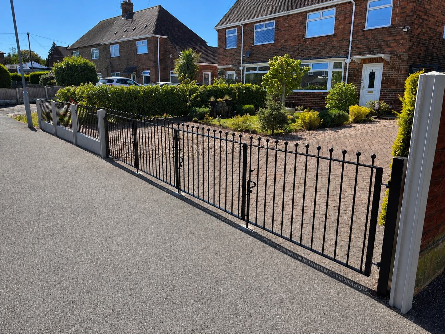 Nottingham Metalworks three foot hight metal driveway gates with  matching metal railings installed in Nottingham