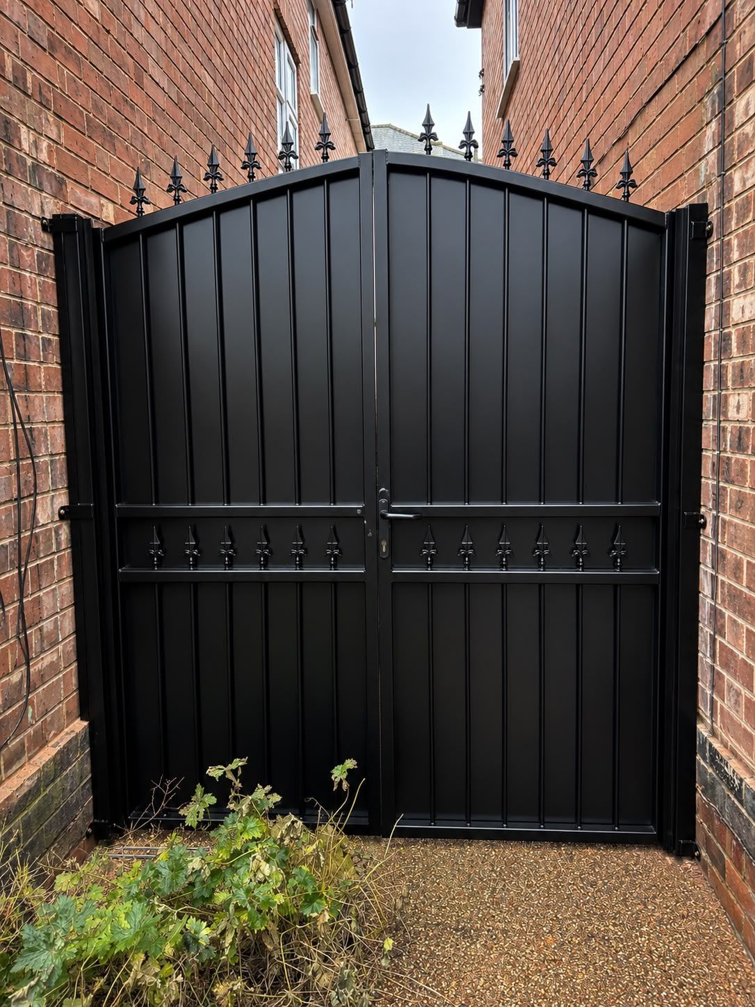 Double Arched Metal Gates with Sheet Metal Infill installed in Nottingham
