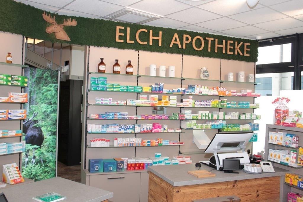 Eine Apotheke mit einem Schild mit der Aufschrift „elch apotheke“