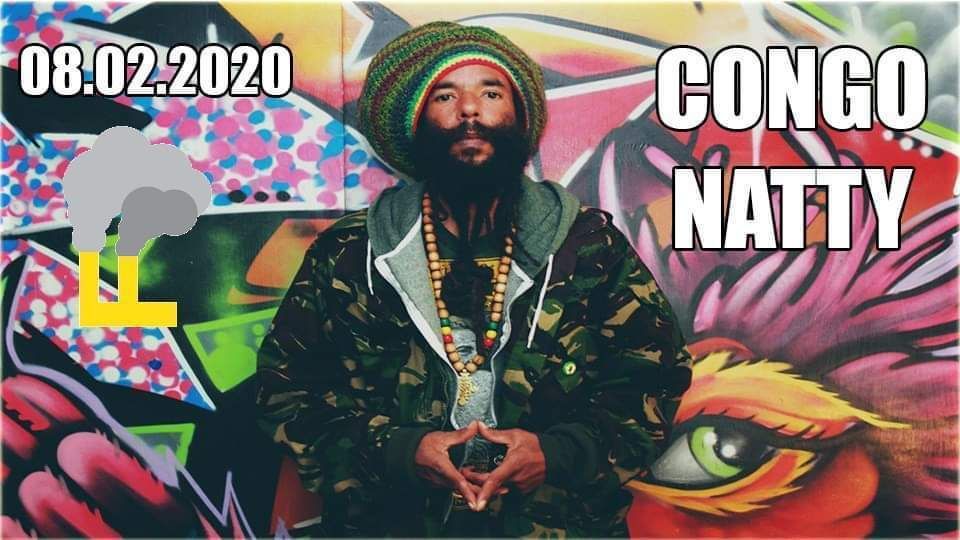 Man in patterned jacket and striped hat against colorful mural, with “CONGO NATTY,” “LL,” and date 08.02.2020 text