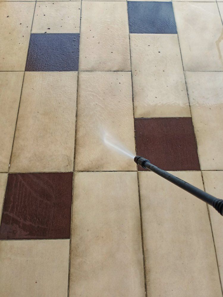 Pressure Washing a Tiled Floor — Glittering Cleaning Service In Townsville, QLD
