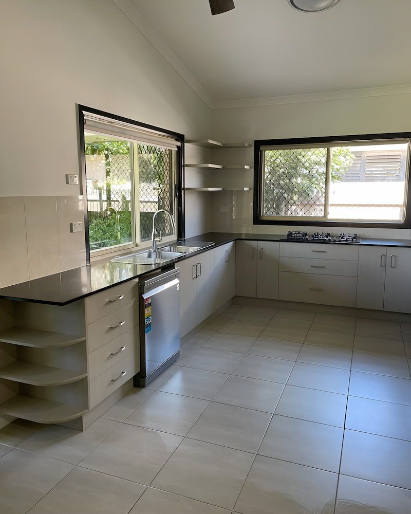 A Clean Empty Kitchen — Glittering Cleaning Service In Townsville, QLD