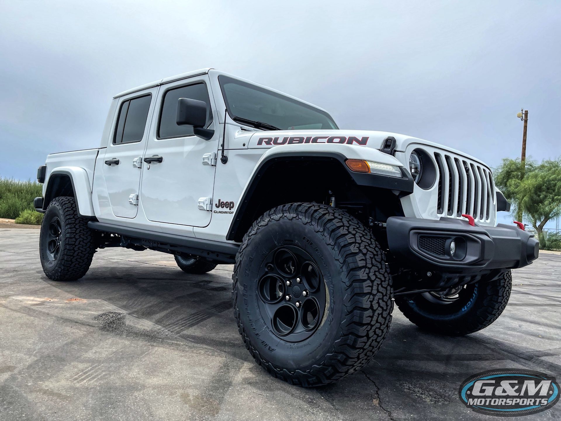 Black Lifted Truck Parked inside shop | G&M Motorsports