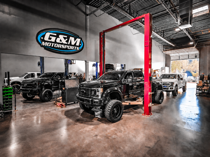 Workshop Interior With Lift Kits And Performance Parts | G&M Motorsports
