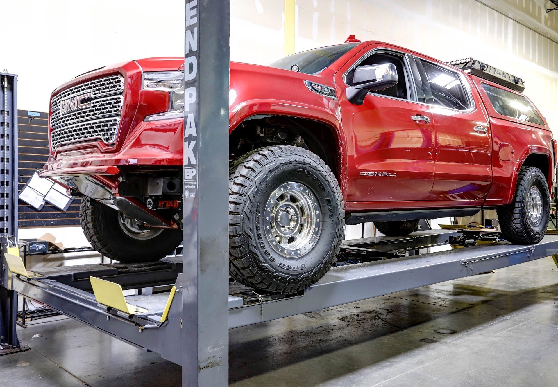Suspension Components And Tools Displayed On Wall Rack | G & M Motorsports