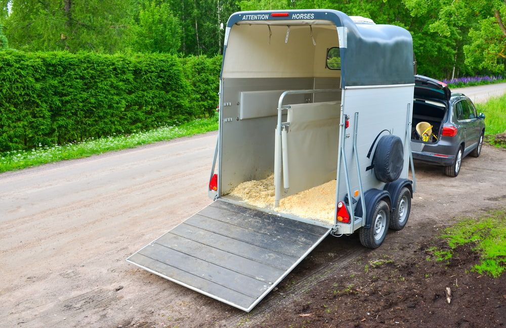 An Empty Horse Trailer Parked By The Roadside — Locqal Car Truck Trailer Rentals in Emerald, QLD