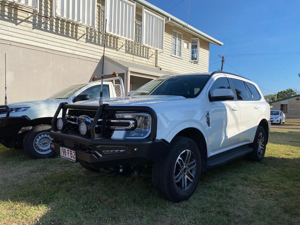 A White SUV is Parked in Front of a House — Locqal Car Truck Trailer Rentals in Emerald, QLD