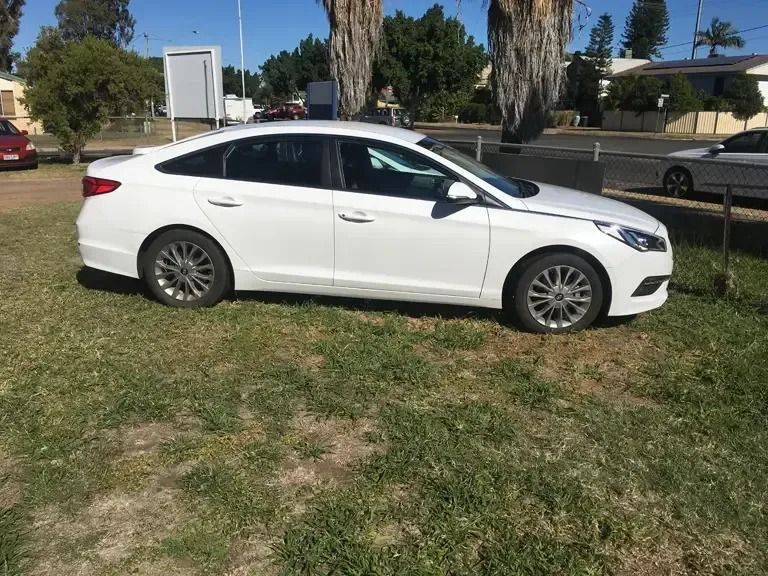 White Car Ready for Car Rental in Emerald