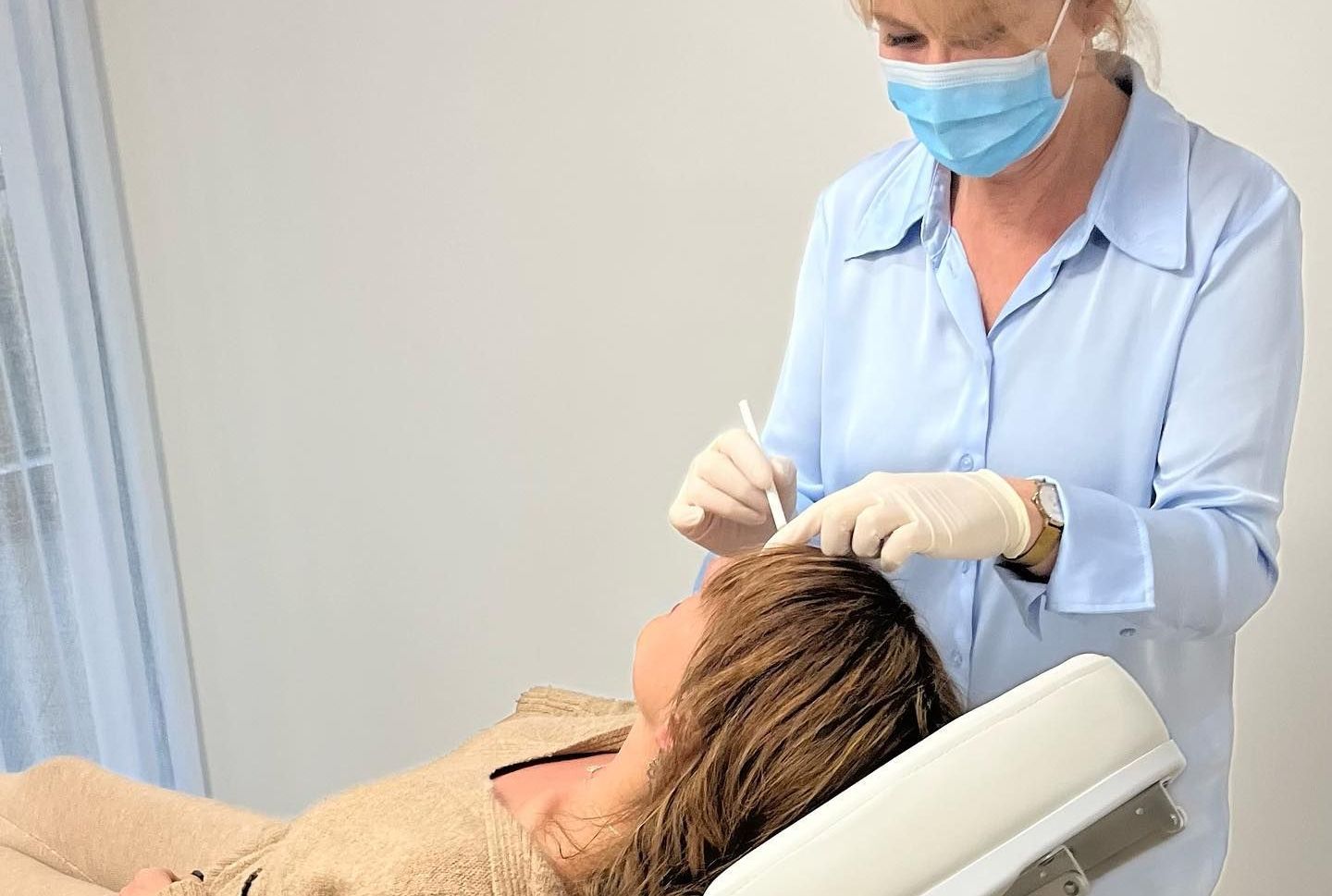 A Woman's Chest Before And After Medical Grade Skin Treatment — Aura Mediclinic in Ashmore, QLD