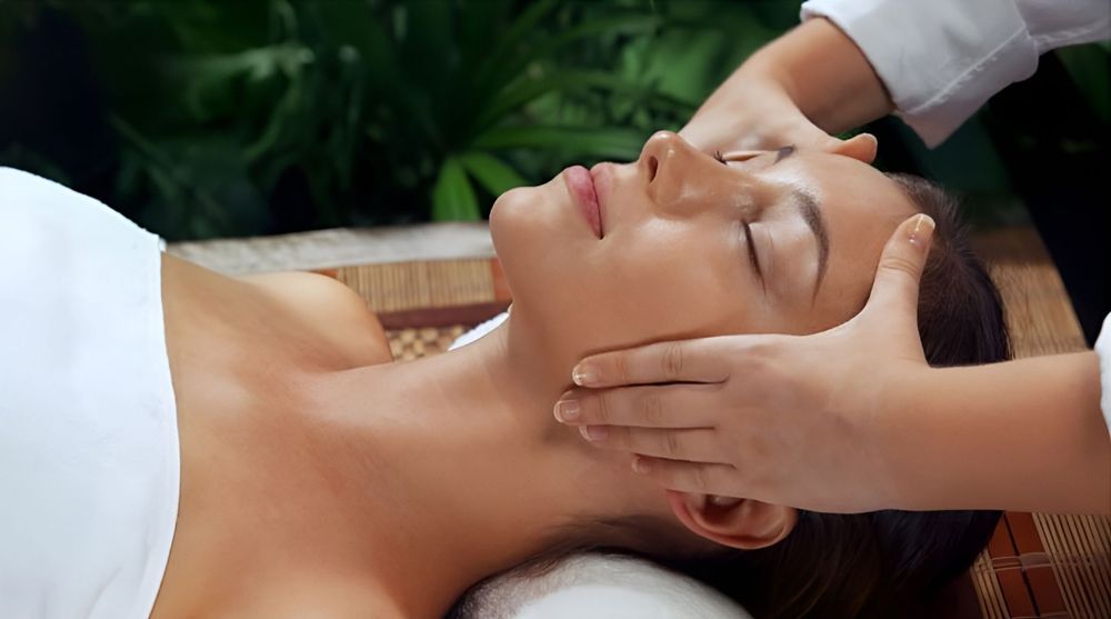 Person Receiving a Facial Treatment at A Cosmetic Clinic