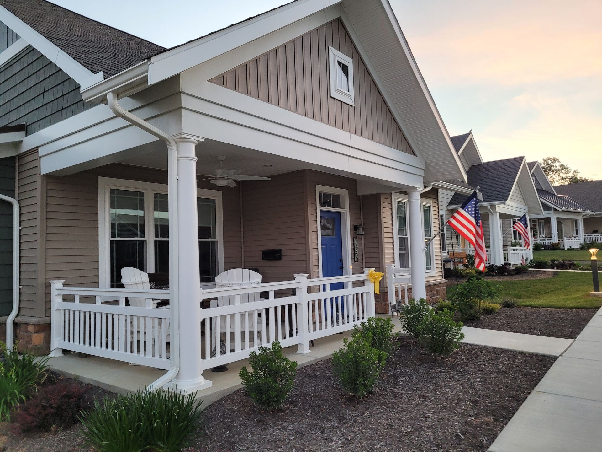 Custom vinyl railings installed around retirement community cottages in New Holland, Pennsylvania
