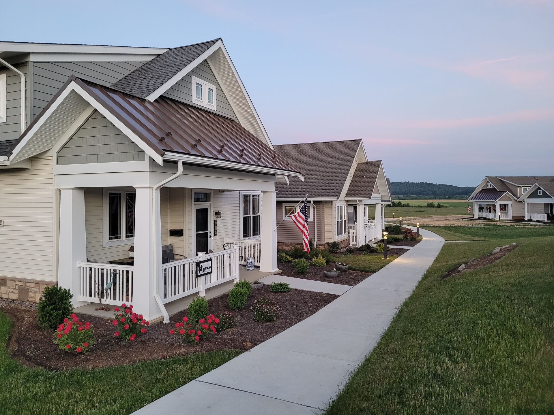 White vinyl railing installation at residential cottages in Garden Spot Retirement Village in New Holland, PA