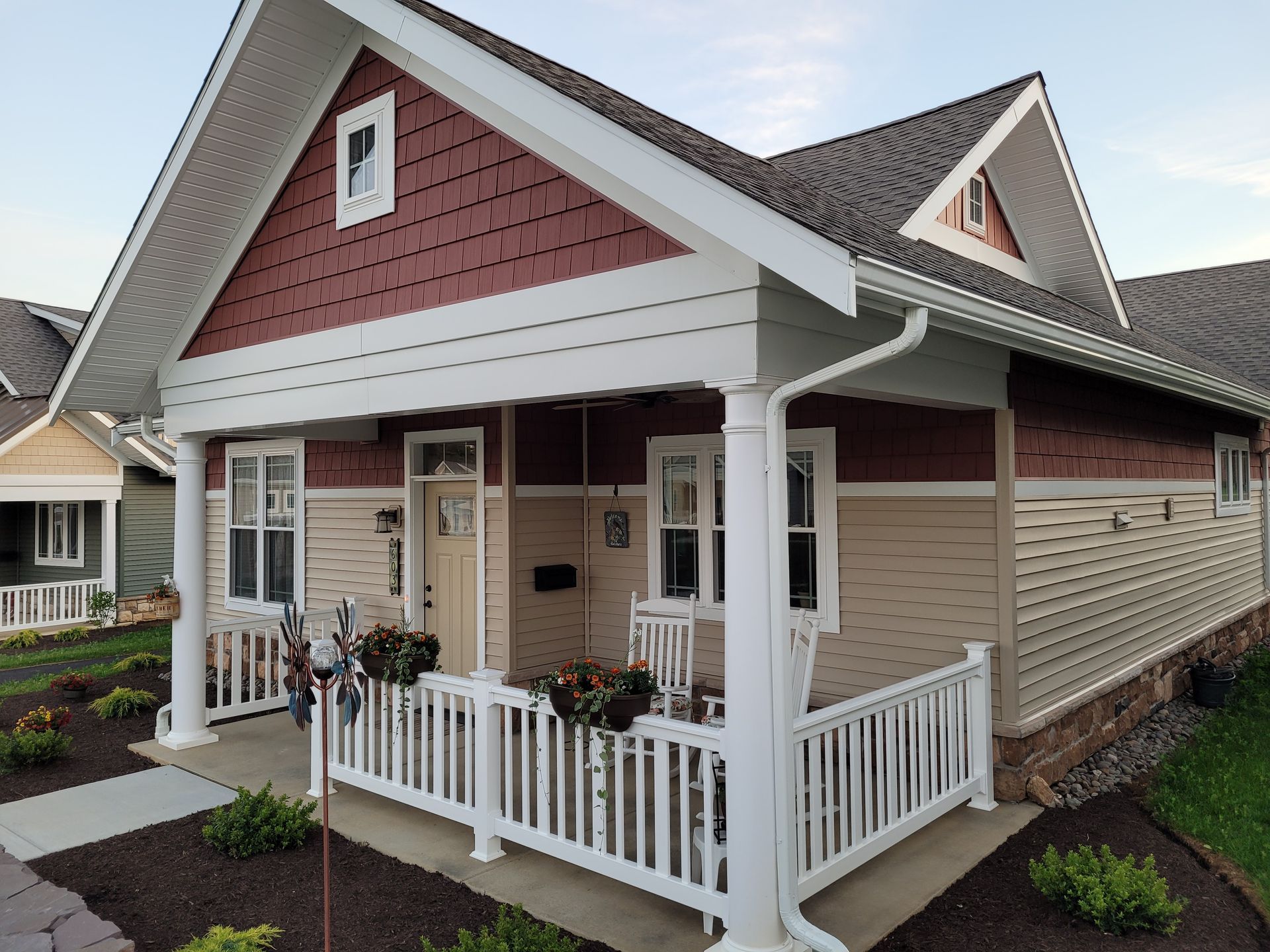 Custom vinyl railings installed around retirement community cottages in New Holland, Pennsylvania