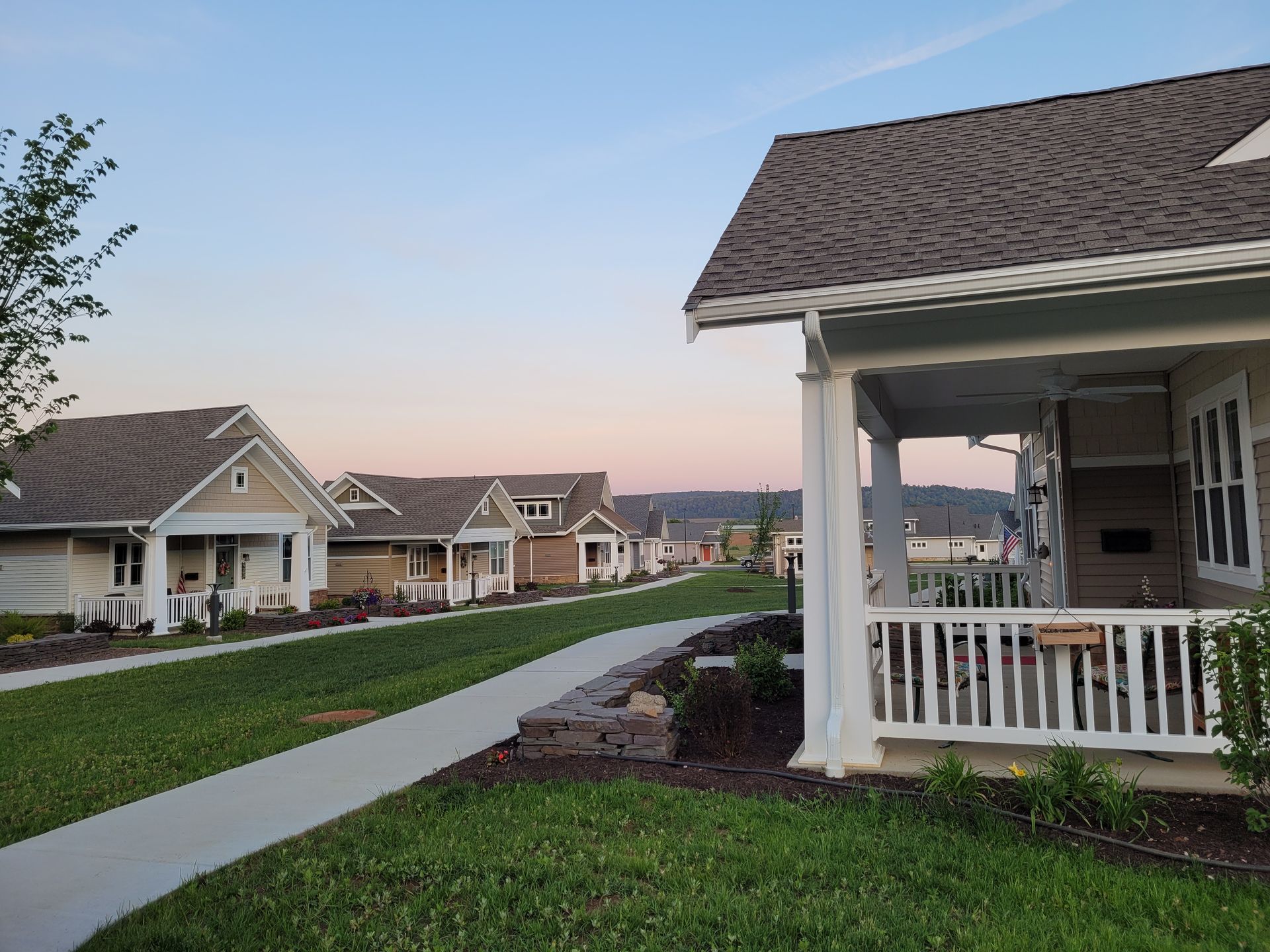Custom vinyl railings installed around retirement community cottages in New Holland, Pennsylvania