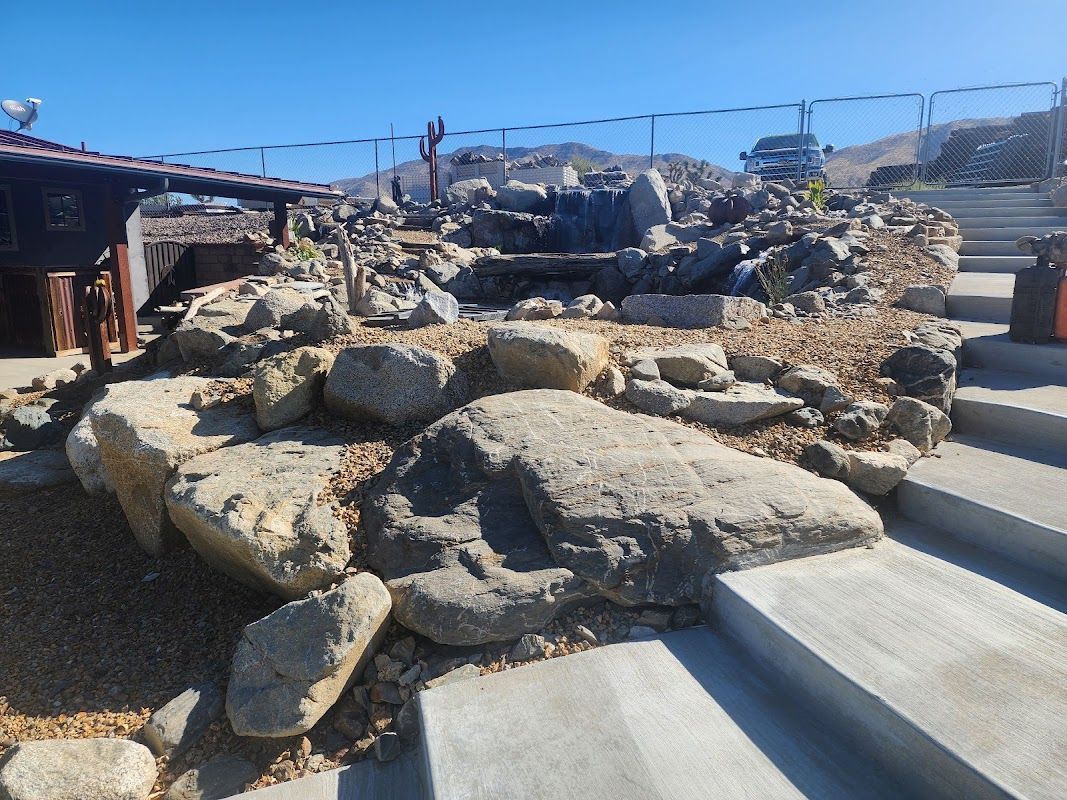 A pile of rocks sitting on top of a set of stairs.