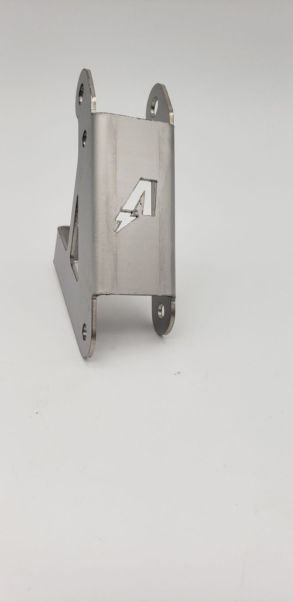 Metal bracket with the number 4 cut out.