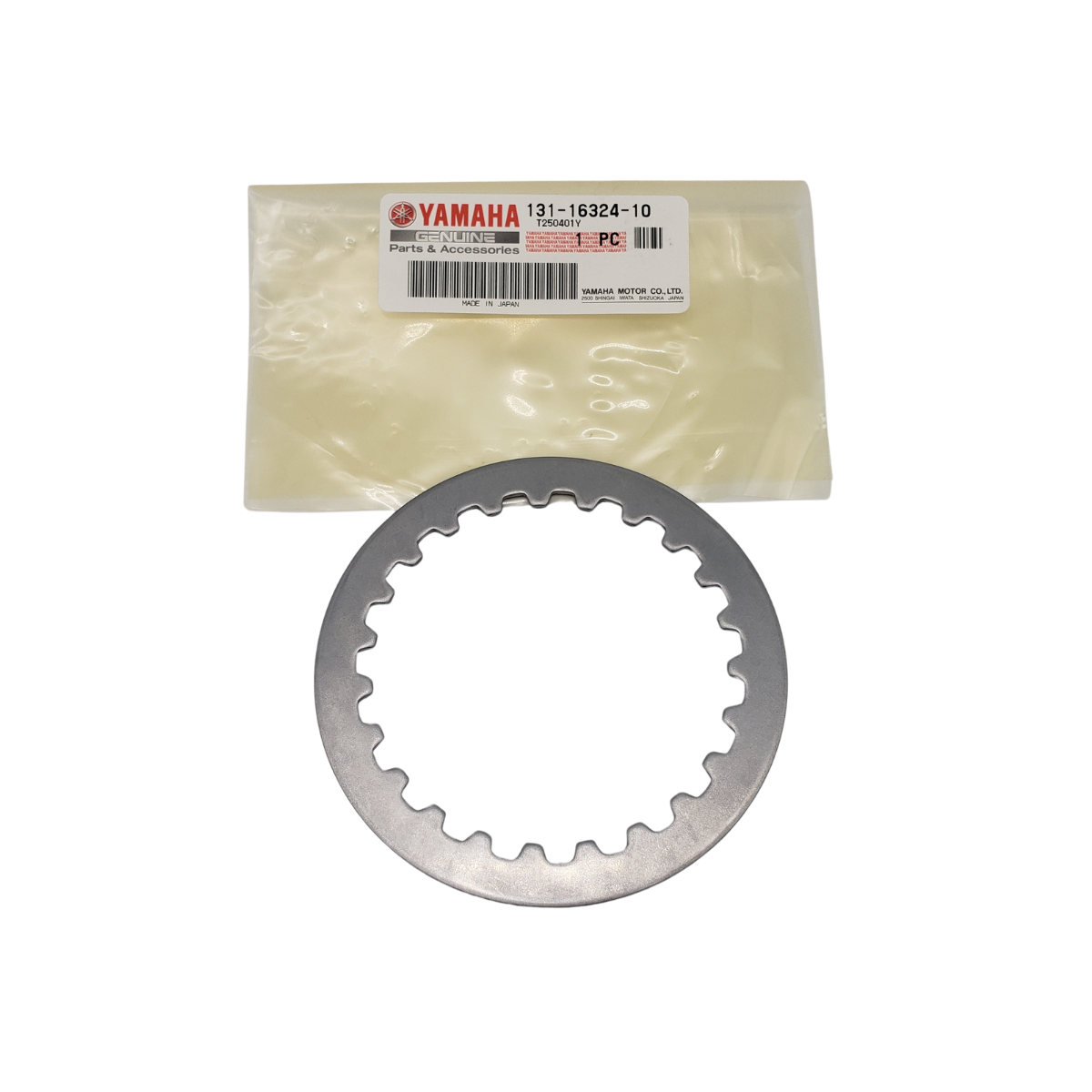 Yamaha motorcycle clutch plate next to its packaging.