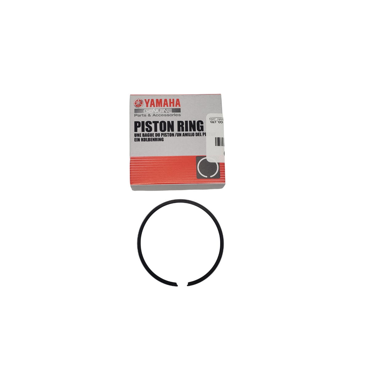 Yamaha piston ring set in its box, with a single, black piston ring below it.