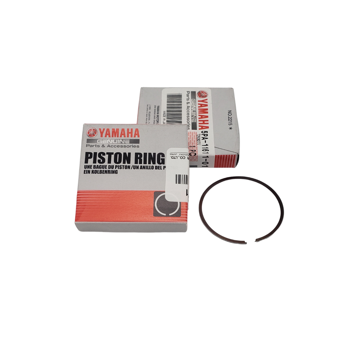 Yamaha piston ring set in boxes, with one ring displayed.