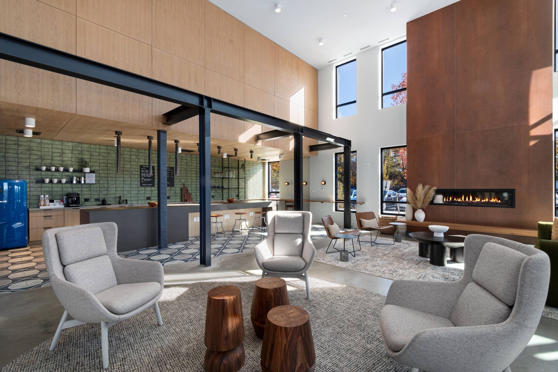 Resident lounge with seating area and modern design at West End Yards. 