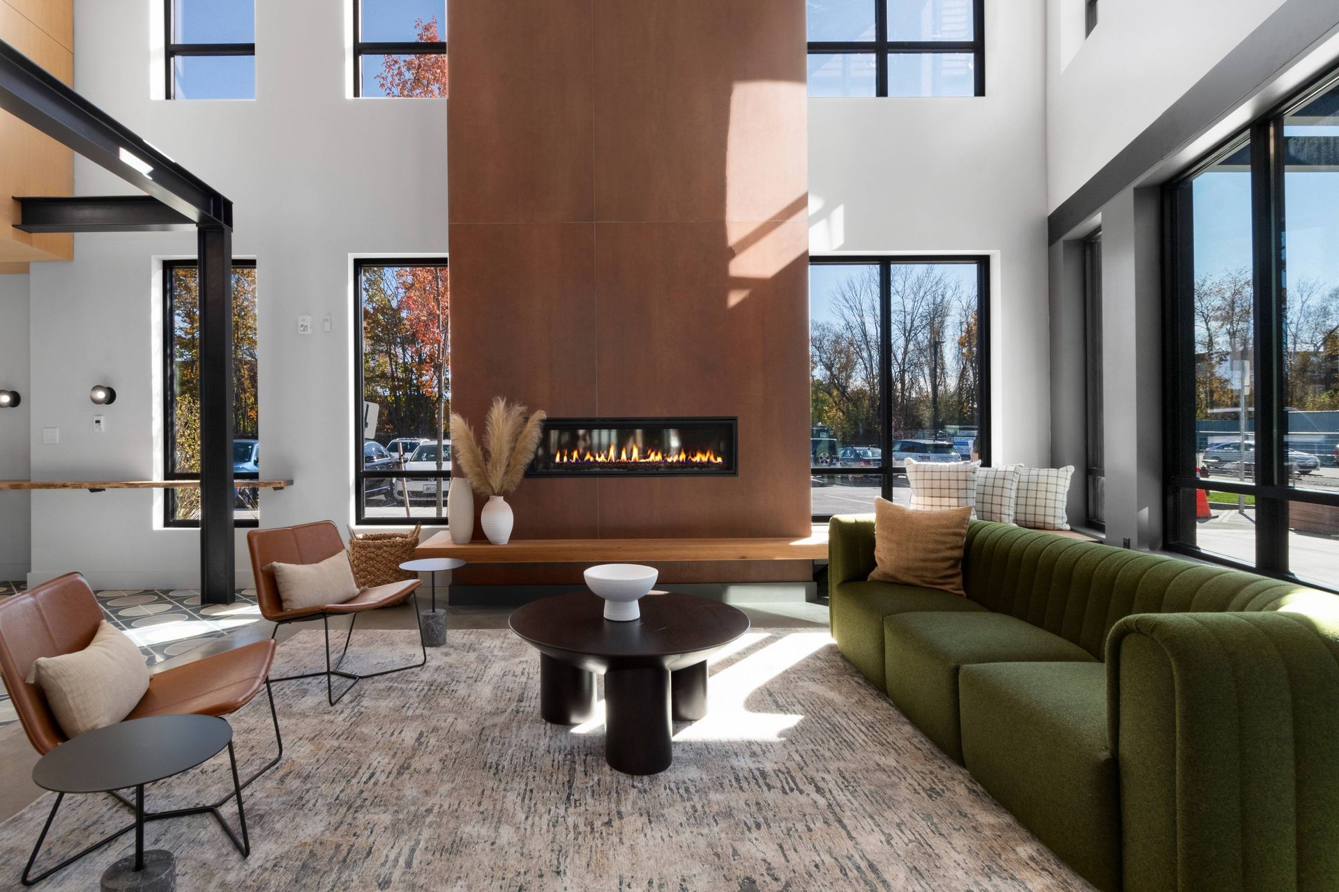 West End Yards high ceiling clubhouse with oversized windows and beautiful community view.