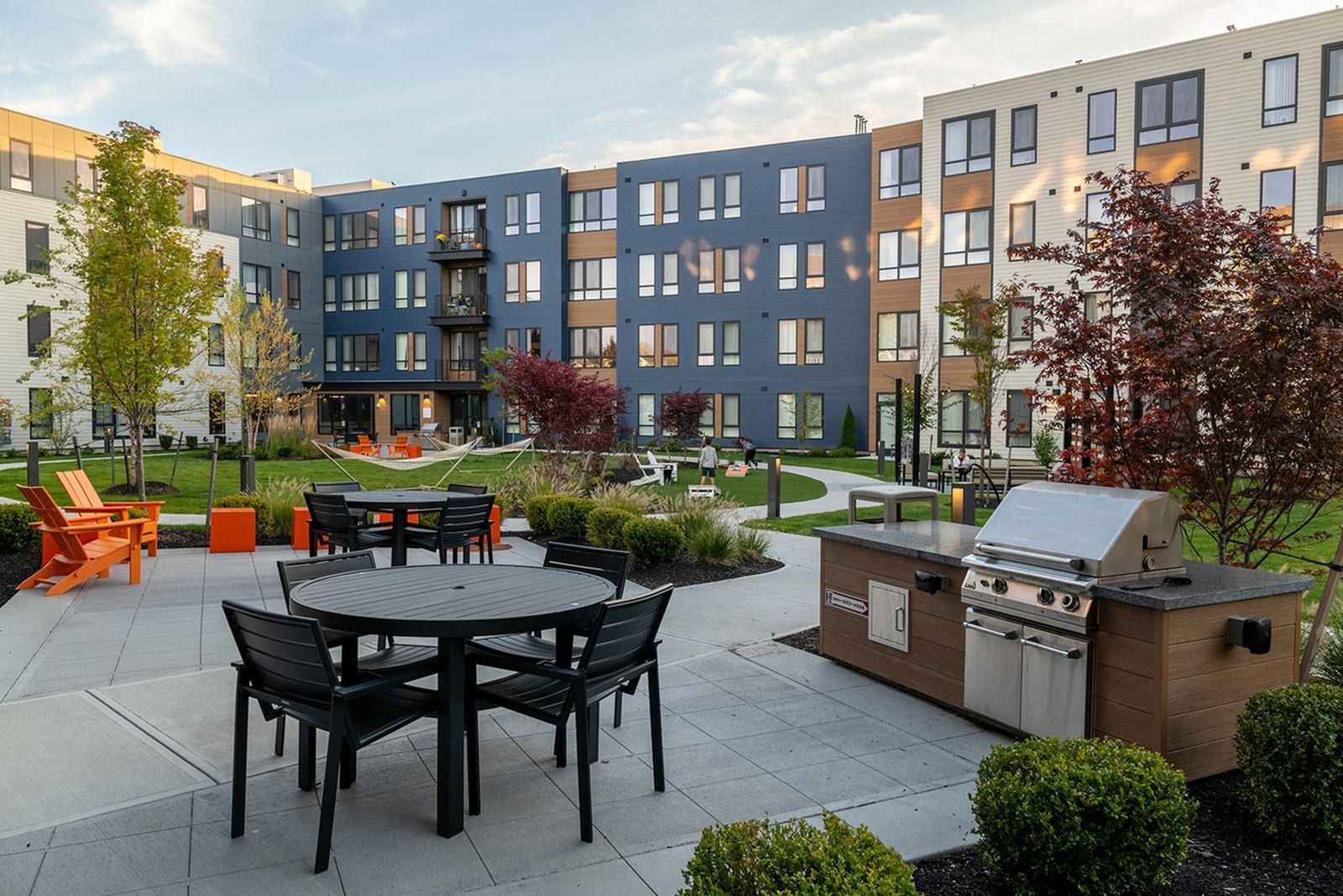 West End Yards outdoor grilling station with seating area.