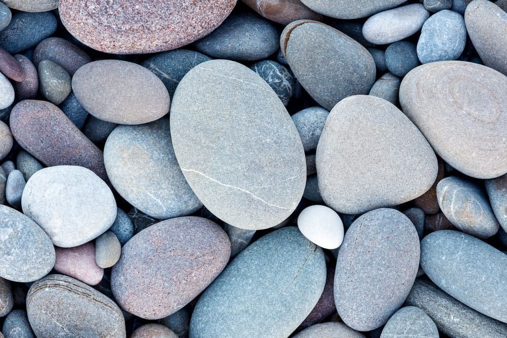 A Pile Of Rocks Of Different Sizes And Colors — Mudgeeraba Landscape Centre In Robina, QLD