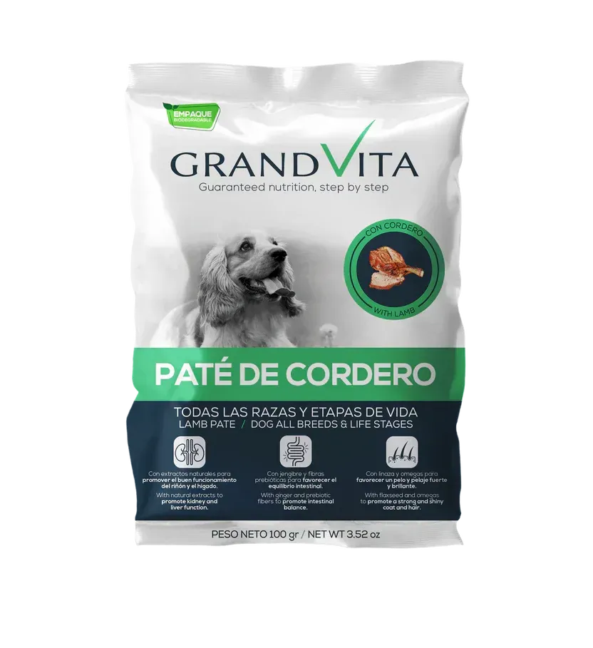 Bolsa de paté de pavo GrandVita para perros. Incluye foto de perro, ilustración de pavo y texto sobre fondo blanco y verde.