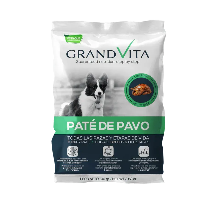 Bolsa de paté de pavo GrandVita para perros. Incluye foto de perro, ilustración de pavo y texto sobre fondo blanco y verde.