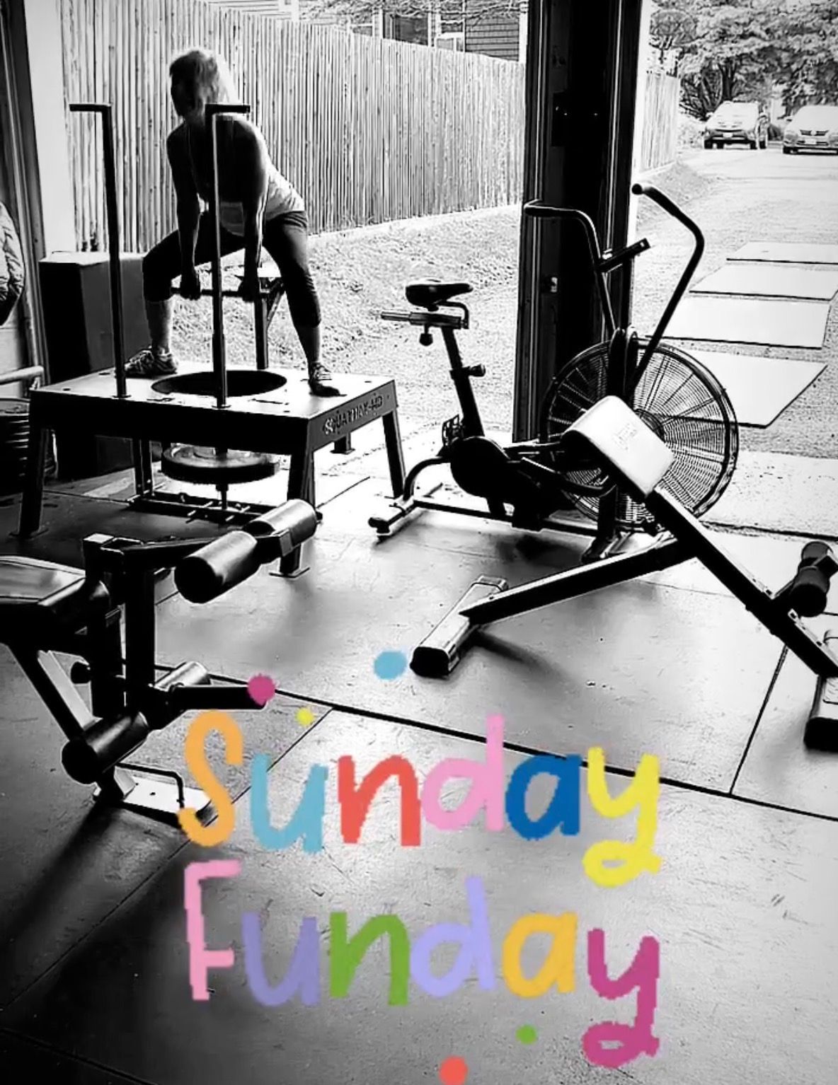 Indoor gym with exercise bikes and a person using equipment, overlaid with colorful “Sunday Funday” text