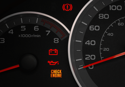 Car dashboard gauges with red warning lights and “CHECK ENGINE” illuminated