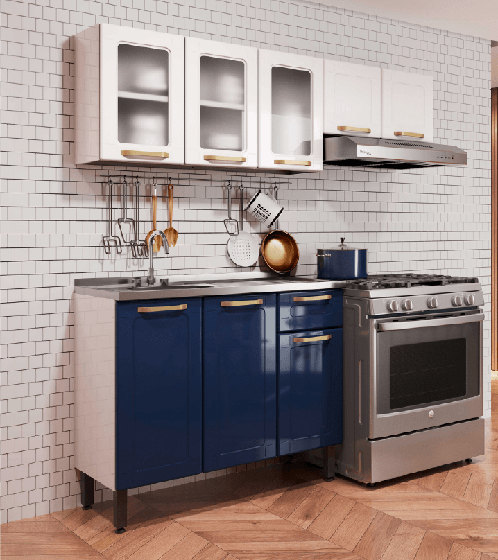 Una cocina con gabinetes azules, una estufa y un fregadero.