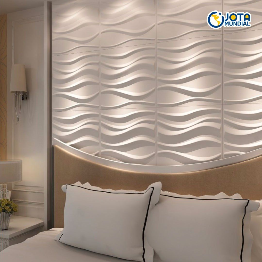 Un dormitorio con una cama y una pared con ondas.