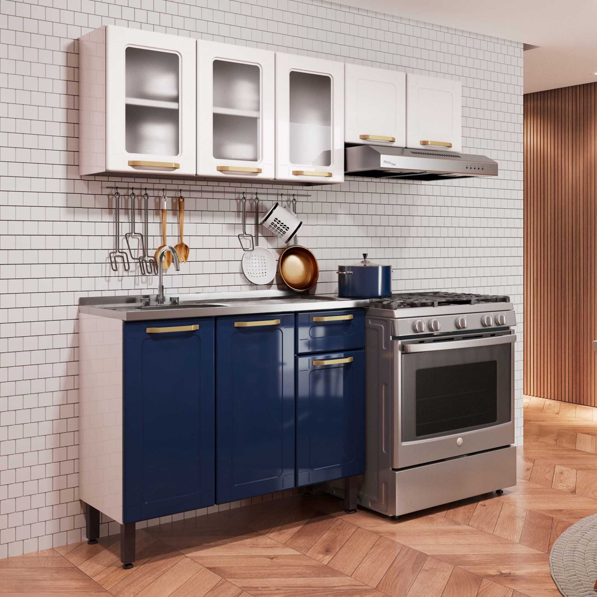 Una cocina con gabinetes azules, una estufa y un fregadero.