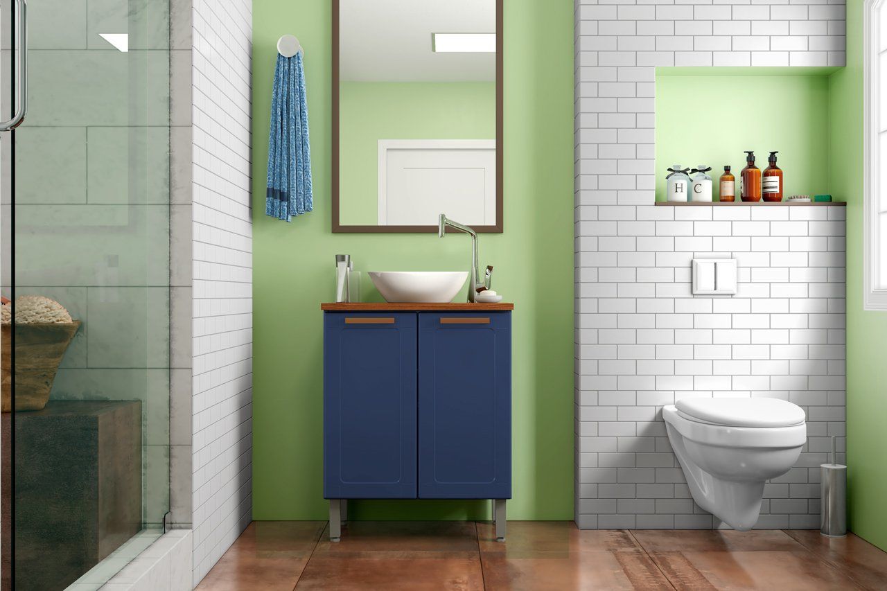 Un baño con lavabo, inodoro, espejo y ducha.
