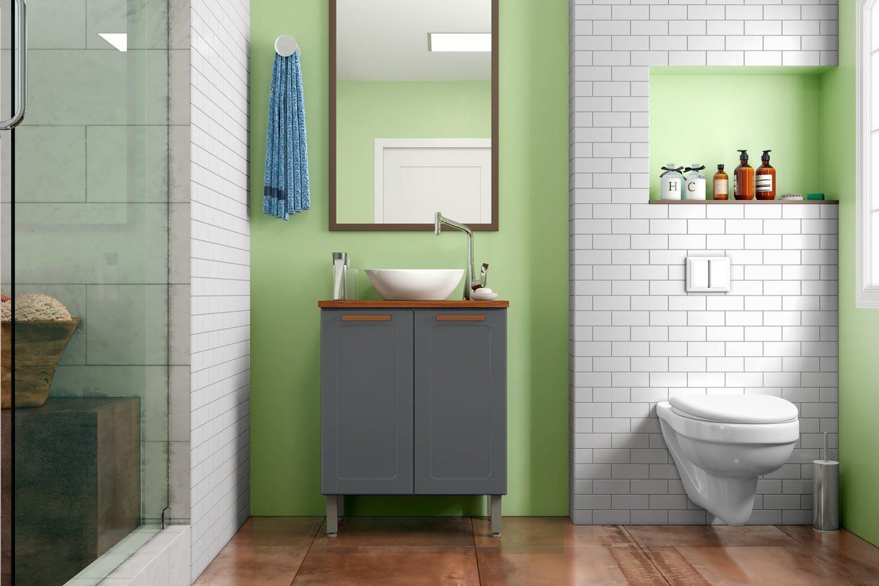 Un baño con lavabo, inodoro, espejo y ducha.