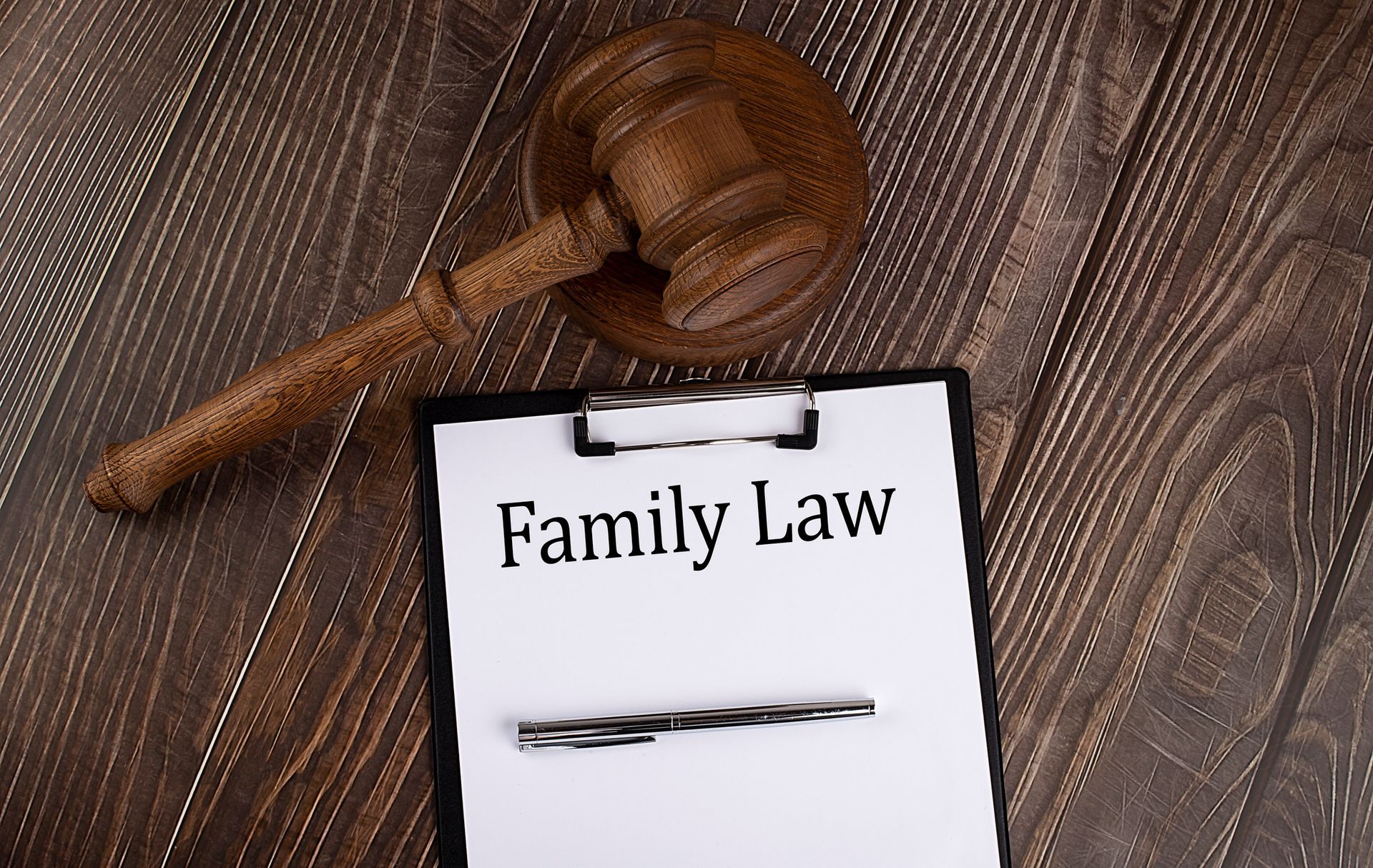 FAMILY LAW text on paper with gavel on the wooden background | Pazner Law Firm | Birmingham, MI