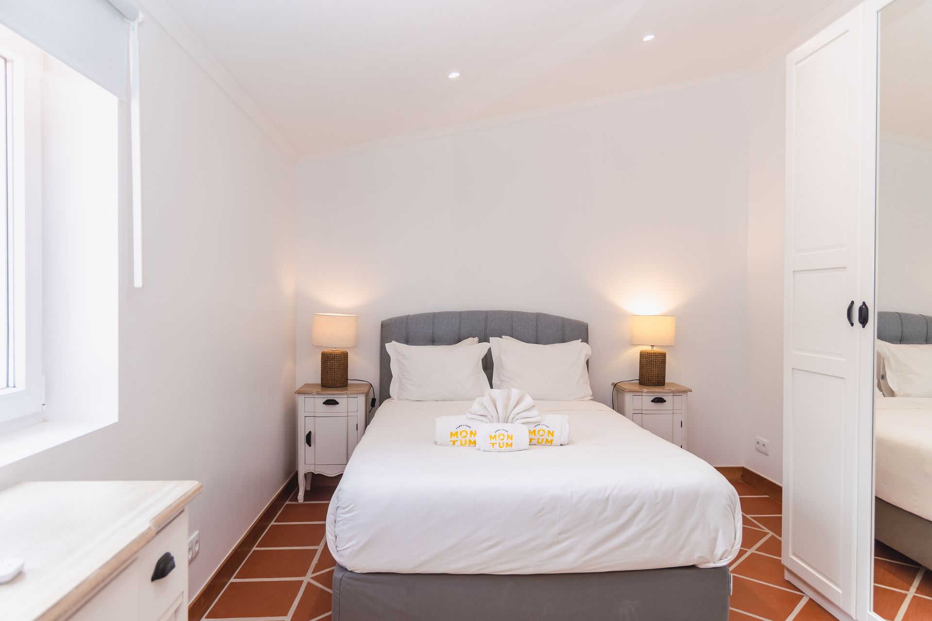 There is a large bed in the middle of the room.