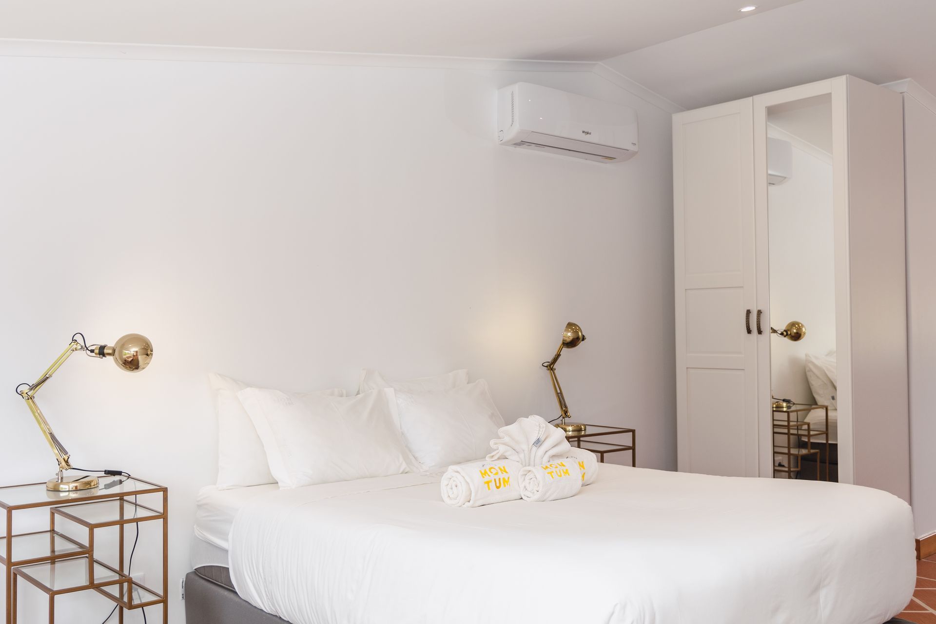 There is a large bed in the middle of the room.