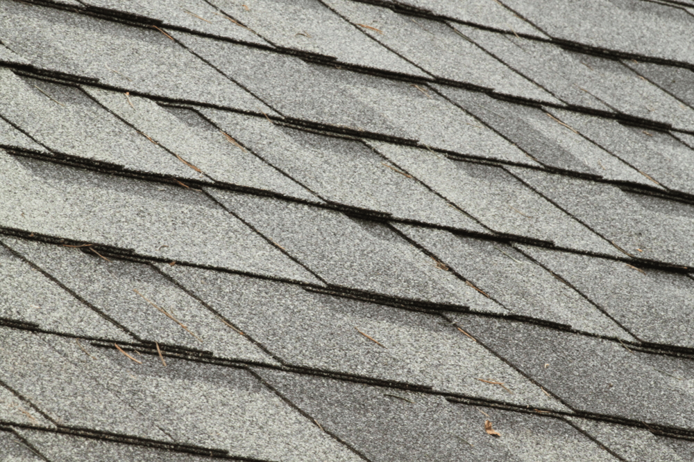 Gray shingled roof with diagonal rows and dark seam lines