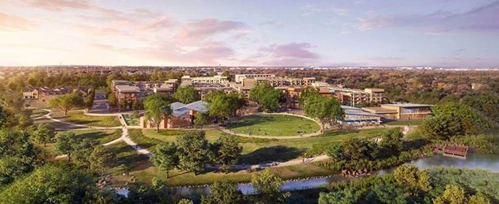 Panoramic rendering of a lush, futuristic eco-city with low-rise buildings, trees, and winding roads at sunrise