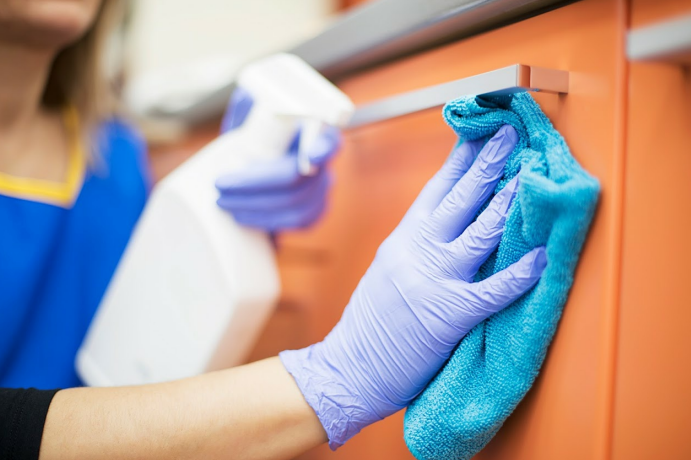Janitorial Personnel Cleaning Desk — Atlanta, GA — Janitorial Services Atlanta