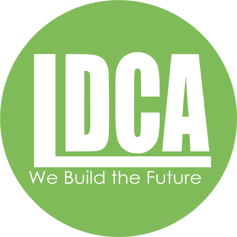 A white logo on a green circle reads "LDCA" with the slogan "We Build the Future" underneath.