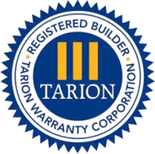 Blue and white Tarion Registered Builder seal with three vertical gold bars and text in a circular border.