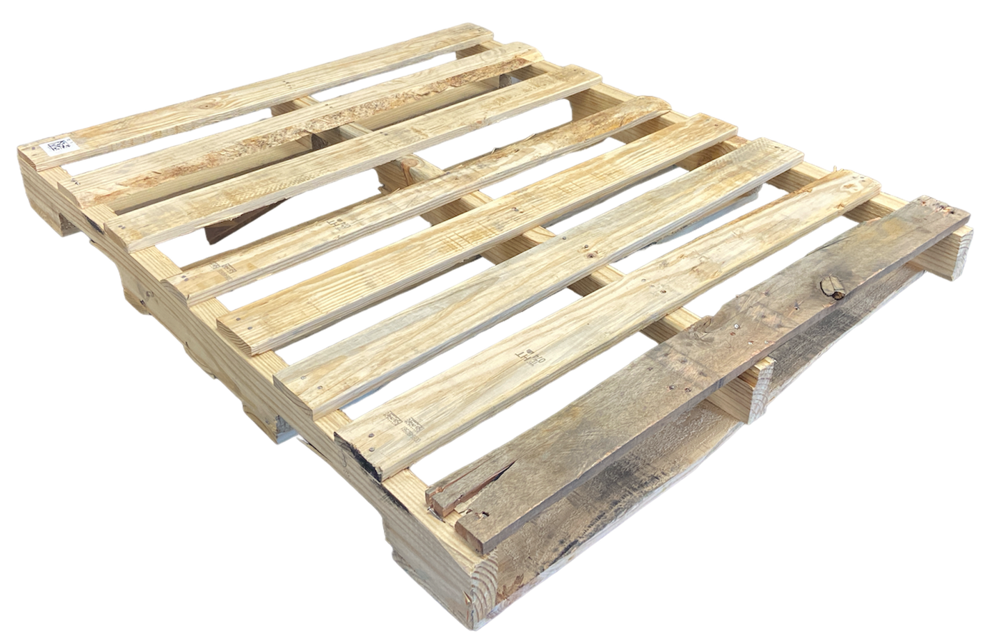 A wooden pallet is sitting on a white surface.