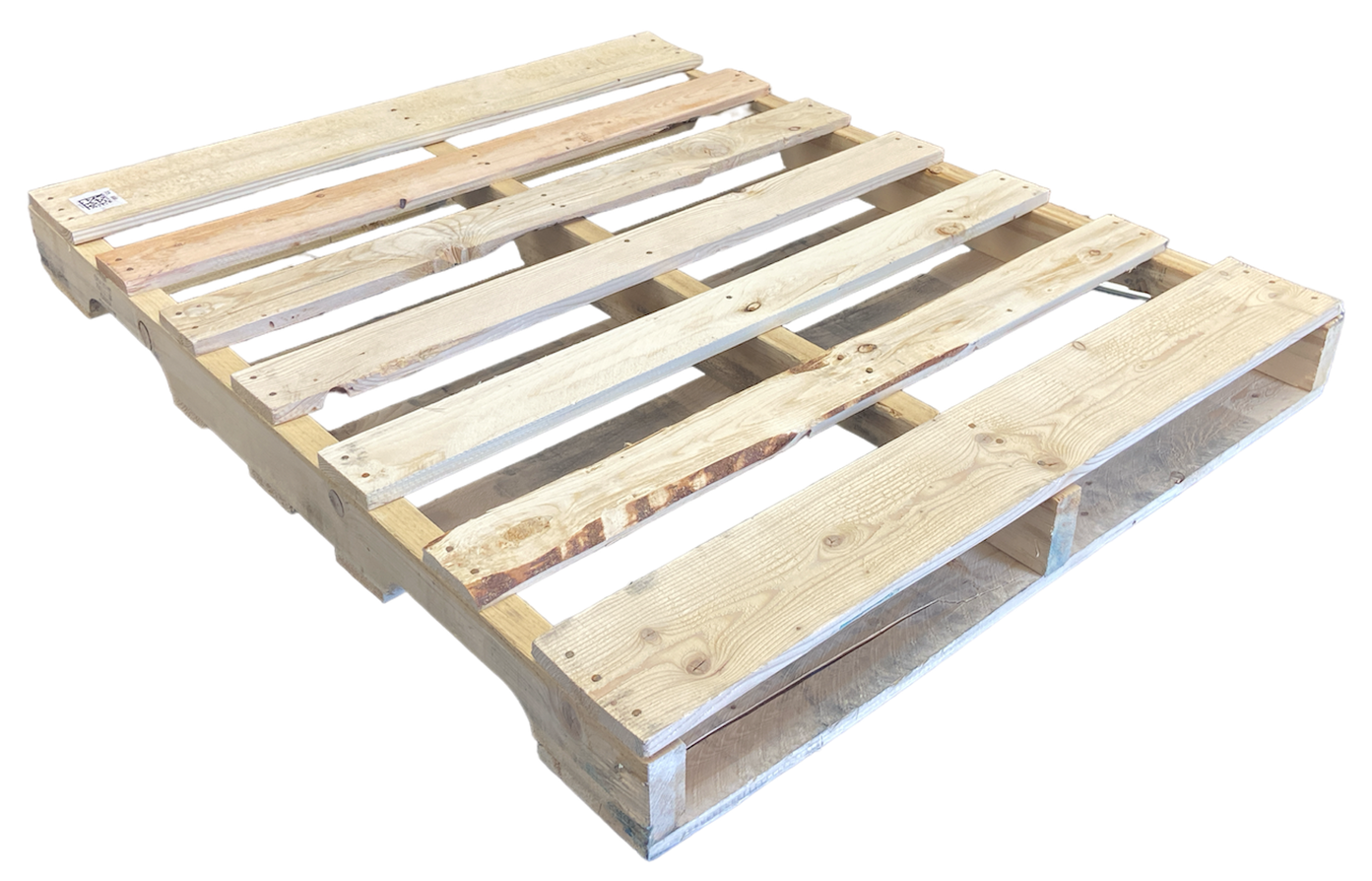 A wooden pallet is sitting on a white surface.
