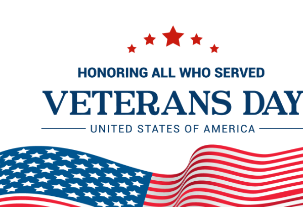 Veterans Day greeting with red stars, blue text, and waving U.S. flag stripes and stars