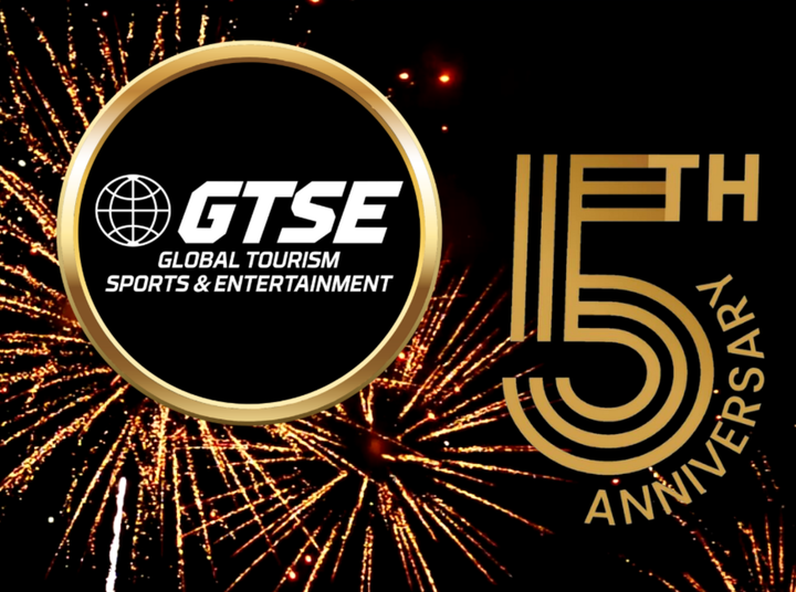 GTSE logo with globe and text, celebrating its 15th anniversary with gold accents and fireworks.