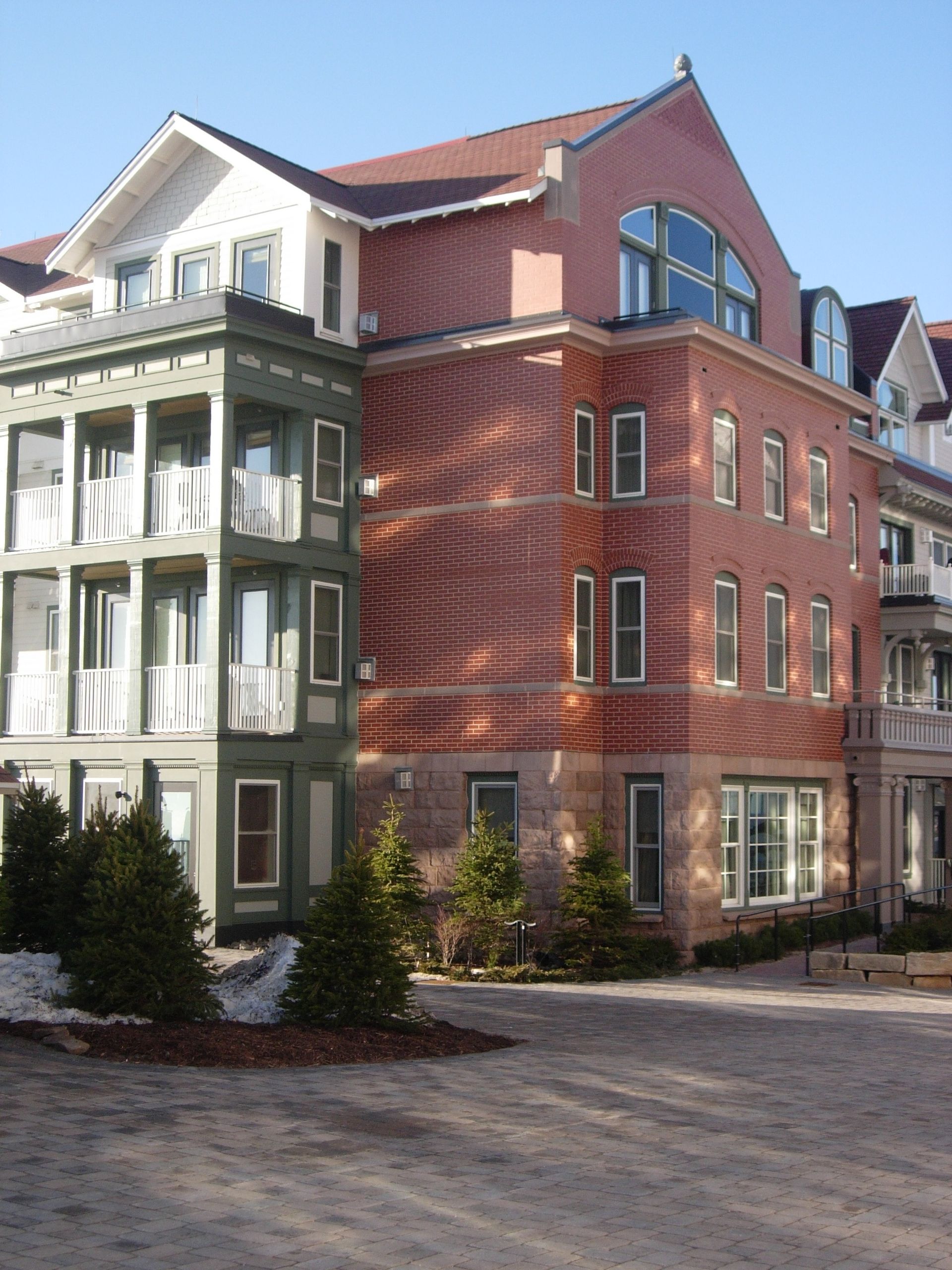 A large building with a lot of windows and balconies
